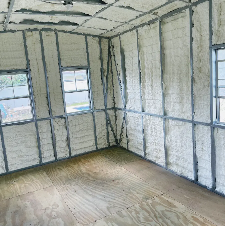 Closed-cell spray foam insulation applied to wall cavities in a residential project in Chicopee